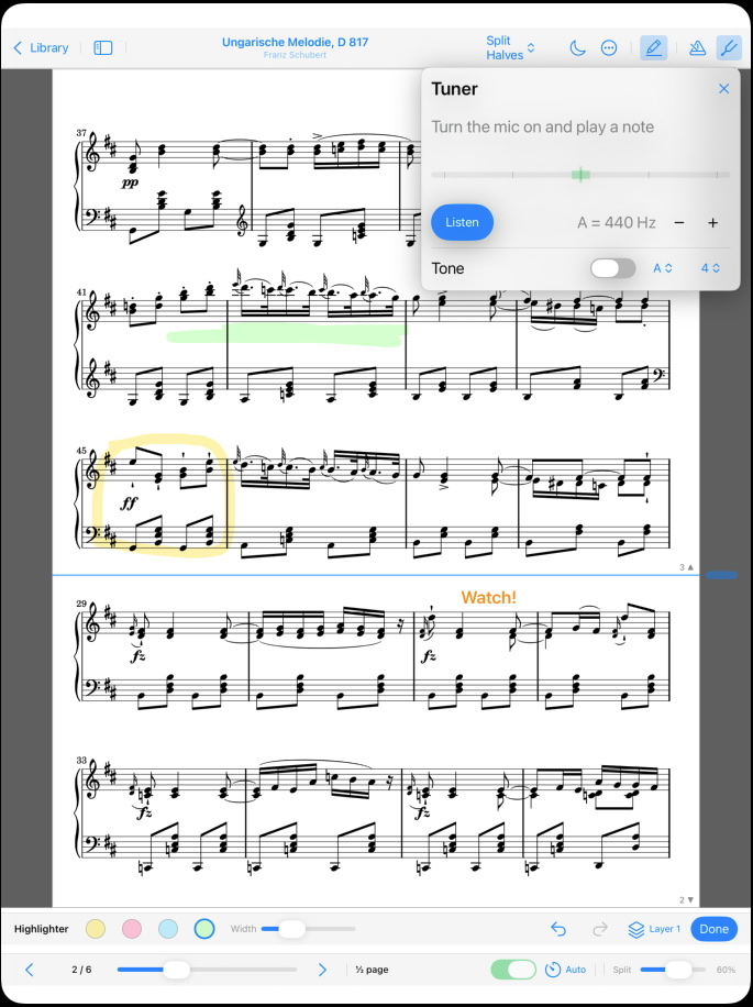 A Schubert score in StageScore split into two half-page panels, marked up with a green highlighter, a boxed passage and an orange "Watch!" cue, with the tuner open at A = 440 Hz.